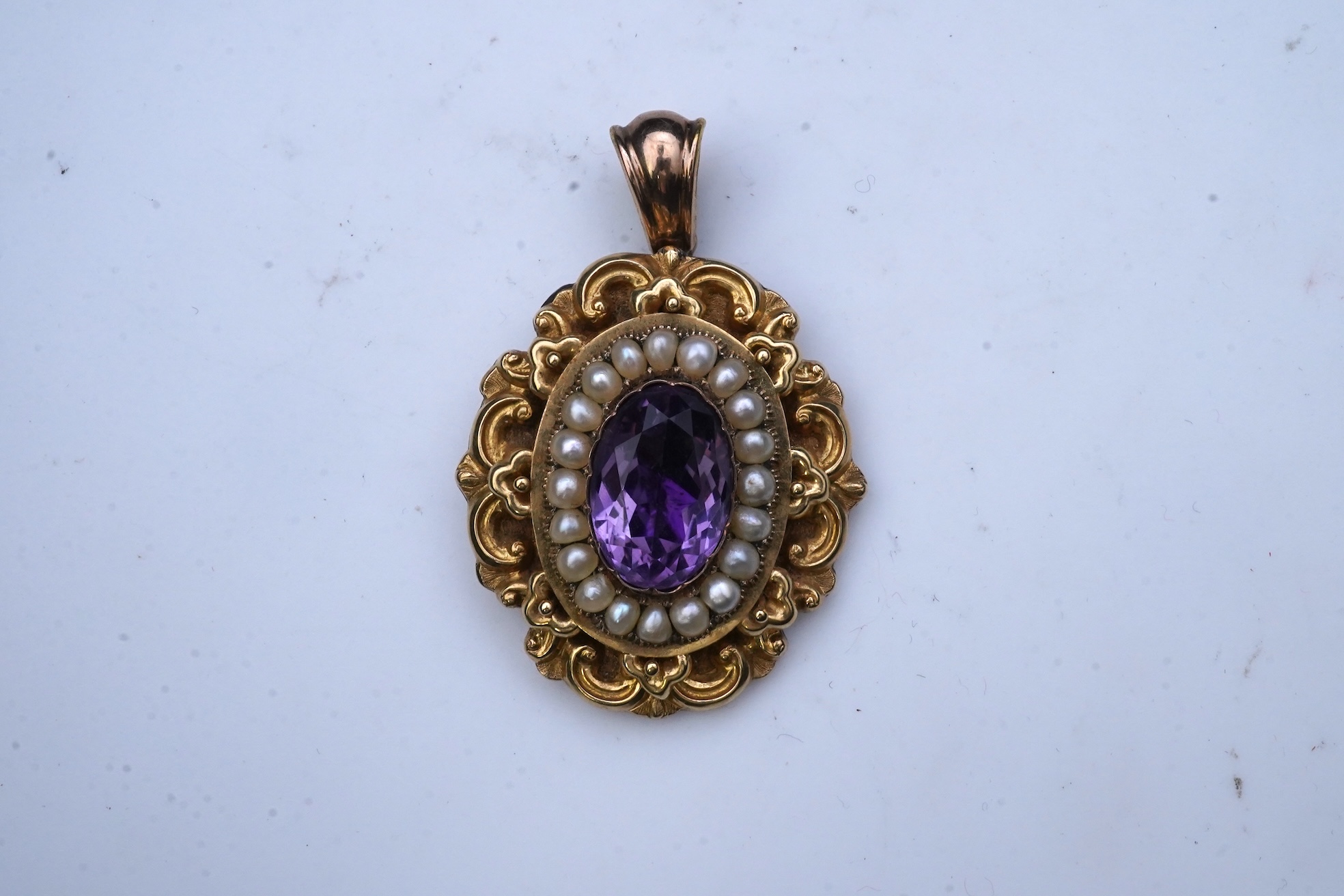 An early Victorian sentimental amethyst and half pearl pendant, circa 1843